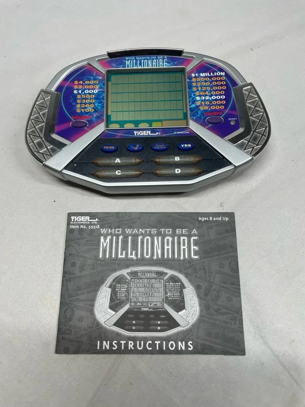 TIGER WHO WANTS TO BE A MILLIONAIRE HAND HELD GAME W/ CARTRIDGE & Manual Works